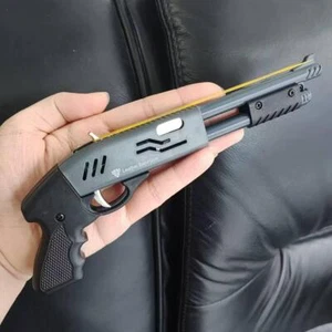Mini pulvérisateur de fusil de chasse à bande en caoutchouc 8 rafales de pistolet à bande en caoutchouc - Photo 1/26