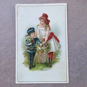 Antique Trade Card Boy Teen Girl Children Garden Flower Bouquet Basket Blue Red - Picture 1 of 4