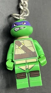 Lego Minifigur Minifigur Schlüsselanhänger TMNT Donatello Neu - Bild 1 von 3