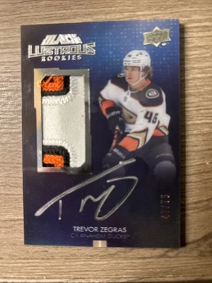 2021-22 SPx UD Black Lustrous /75 Trevor Zegras RPA Rookie Patch Auto 3 Color SP - Image 1 of 4