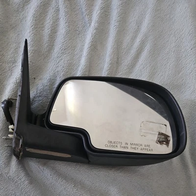 Espejos retrovisores laterales eléctricos térmicos con luces de charco (negro) para Chevy GMC 2000-2002 Foto 1 de 4