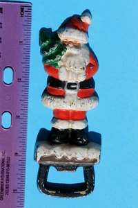 APRIBOTTIGLIE VINTAGE IN GHISA BABBO NATALE CON ALBERO DI NATALE - Foto 1 di 4