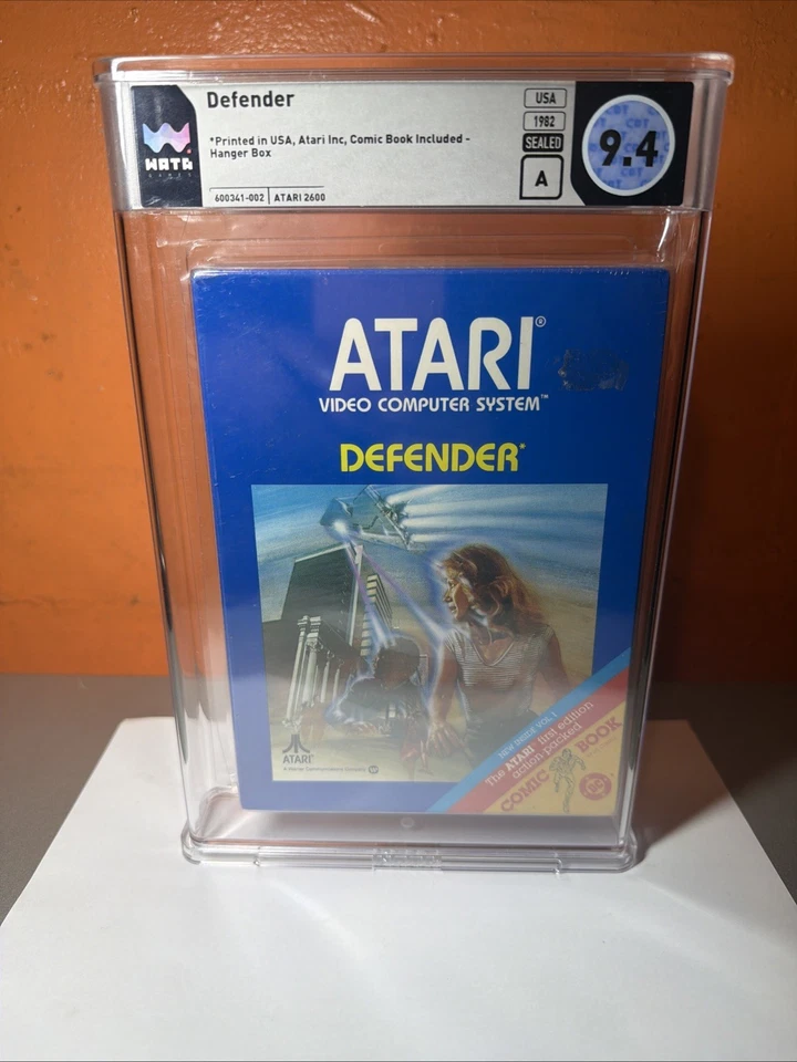 Defender (Atari 2600, 1982) Comic Book Hanger Box NEW SEALED WATA GRADED 9.4 - Image 1 of 4