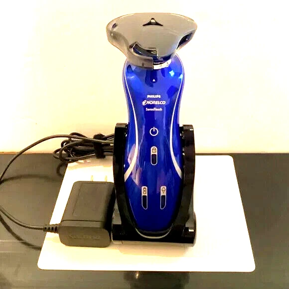 Philips Norelco RQ11 1150x Sensotouch afeitadora en seco y húmedo con recortadora negra Foto 1 de 1