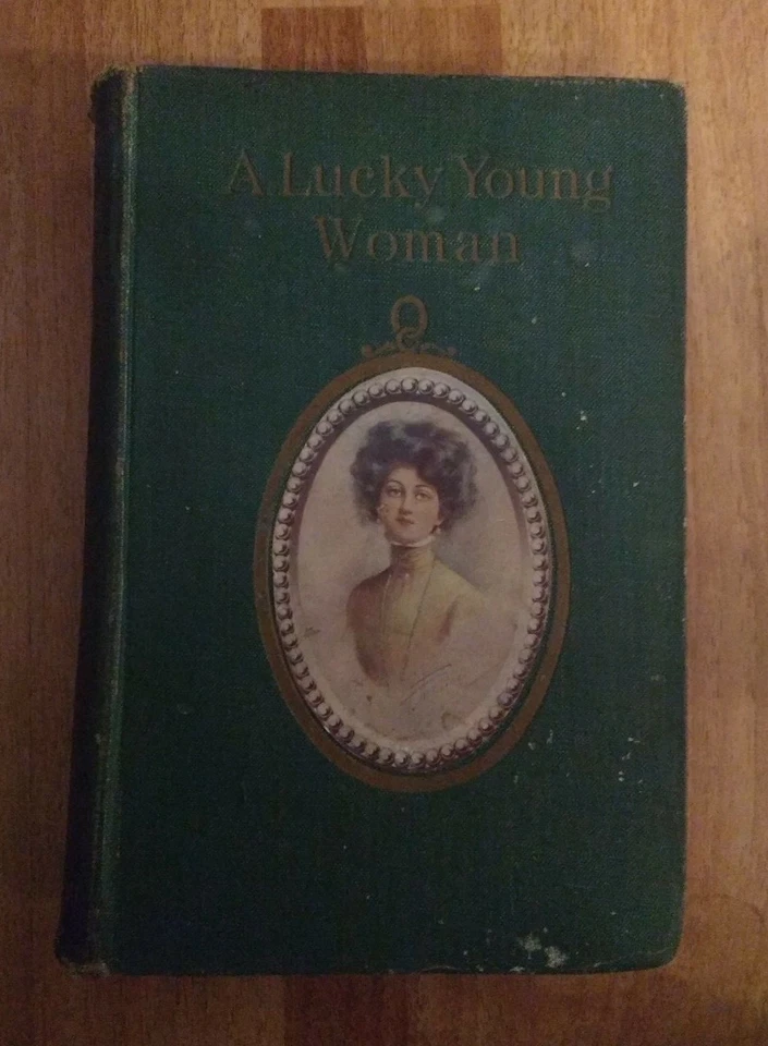 A LUCKY YOUNG WOMAN by F.C. PHILIPS- EVELEIGH NASH - Hardback - 1910 - Image 1 of 1