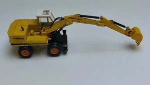 Escavatore 1:50 NZG # 174 FAUN HM 1035 giallo insonorizzato ottime condizioni dettagliato - Foto 1 di 10