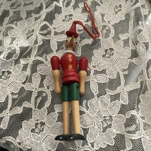 Vintage 12 inch tall wooden jointed Pinocchio W/hanger Italy - Picture 1 of 4