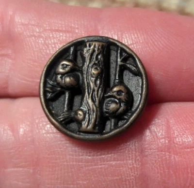 Vintage 2 Bird Picture Button Metal Story Ducks Looking Around Tree Truck  - Image 1 of 4