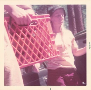 Vintage 1974 Color Snapshot Photo Woman Holding Red Milk Crate Outdoors - Picture 1 of 2
