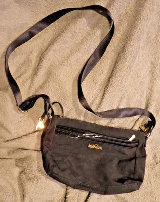 BOLSO BANDOLERA NEGRO KIPLING MAKE HAPPY FORRADO ROSA Foto 1 de 4