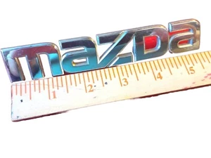 2004-2009 Mazda 3 Emblem Name Plate OEM Used Factory Part BN8V-51-710A - Picture 1 of 3