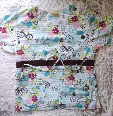 Tafford Women's Medical Scrub Top. Size S. Vintage Bicycle Pattern Has Tie Strap - Image 1 of 4