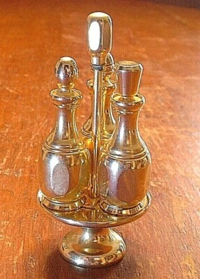 Botellas de perfume miniatura enchapadas en oro de 18 quilates inusuales en soporte Foto 1 de 4