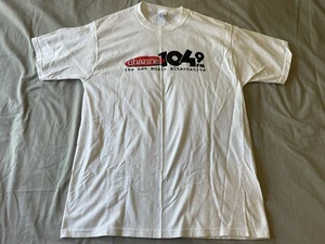 CAMISA VINTAGE MÚSICA ALTERNATIVA RADIO 104.9 FM HOMBRE GRANDE FRUIT OF LOOM LOFTEEZ - Imagen 1 de 6