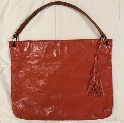 Cartera de cuero envejecido naranja Latico flecos bolsillos interiores limpios Foto 1 de 4