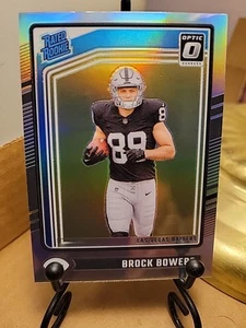 2024 Optic Brock Bowers Rated Rookie Silver Holo Prizm SP RC No. 215 RAIDERS - Imagen 1 de 3