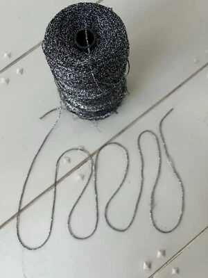 Металлическая вискоза/поли пряжа от Darella, конус, черный/серый/серебристый, сделано в Италии - Изображение 1 из 4