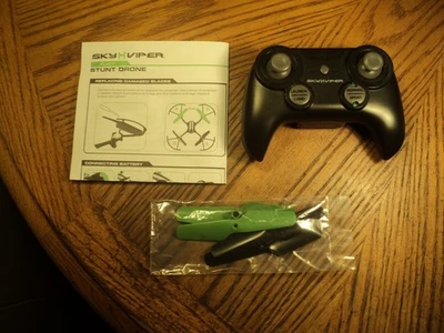 Sky Viper Misc. Controller No. 01943TX,  Flying Guide & Spare Rotors  China - Image 1 of 4