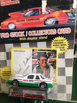 DAVID NICKENS "CASTROL GTX" 1/64 NHRA COMP ELIMINADOR DIE CAST AMARELADO PKG - Imagem 1 de 2
