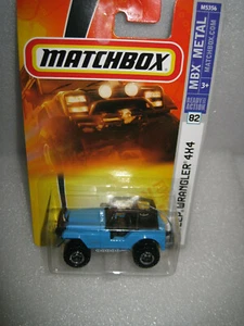 MATCHBOX 1/75 MBX METAL #82 JEEP WRANGLER 4X4 BLUE LONG CARD OLD STOCK - Picture 1 of 2