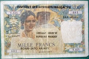 MADAGASCAR  1000 1 000 FRANCS NOTE FROM 1961 ISSUE ,P54, OVERPRINT ON P48 (1952) - Picture 1 of 2