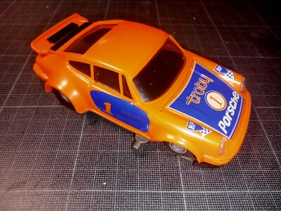 Elektrisches Rennbahn Auto TROBY SLOTLESS - PORSCHE 911 - Motor OK - 2 Bürsten - Bild 1 von 4
