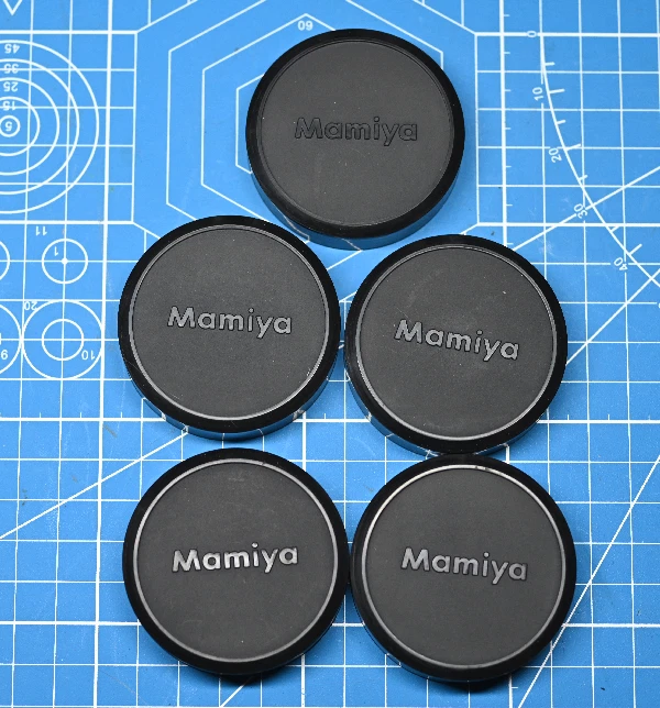 Original NEW Lot of 5 Mamiya Plastic Slip on Lens Caps 51mm - Image 1 of 1