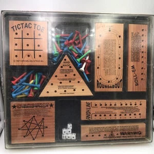 Juegos de rompecabezas de madera maciza 7 rompecabezas diferentes de Cardinal Games - Imagen 1 de 6
