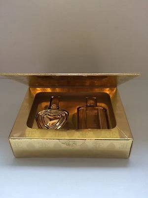 Minis ESCADA Margaretha Ley 4 ml & ESCADA Pour Homme 5 ml EDICIÓN LIMITADA DORADA Foto 1 de 4