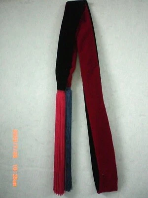 Faja de baile de calabaza 1/2 roja con flecos azules de 14", 1/2 azul con flecos rojos de 14" Foto 1 de 2