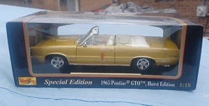 MAISTO SPECIAL EDITION 1965 PONTIAC GTO HURST EDITION!!! GOLD CONVERTIBLE!!! - Picture 1 of 6