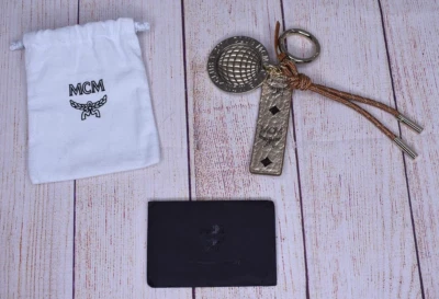 NEW NWOT Club MCM Leather Globe Keychain Key Fob Gold Tone W/ Card & Dustbag - Image 1 of 4