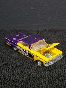 Racing Champions 1960 Chevy Impala Six Flags Purple/Yellow Diecast #105 - Picture 1 of 4