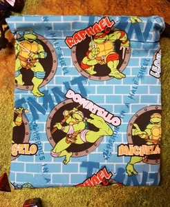 TMNT Teenage Mutant Ninja Turtles Brick Wall dice bag, card bag, makeup bag - Picture 1 of 1