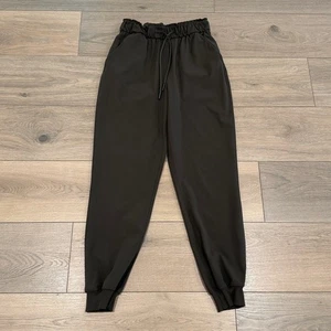 LULULEMON Jogger a vita alta elasticizzato oliva scuro lunghezza intera Luxtreme Active taglia 4 - Foto 1 di 11