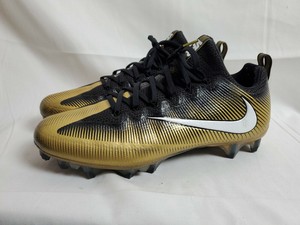 white and gold nike cleats