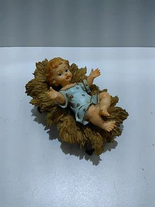 RELIGIÖSE FIGUREN KRIPPE JESUSKIND AUS HARZ UND KERAMIK - Bild 1 von 1