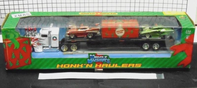 Muscle Machines 2004 Honk'N Haulers, KW truck w/'57 Chevy, '50 Studebaker, and ? - Image 1 of 4