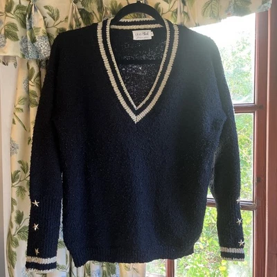 Retro V Neck Designer Jumper Black With Gold V Neck & Gold Stars On Sleeves M/L - Image 1 of 4