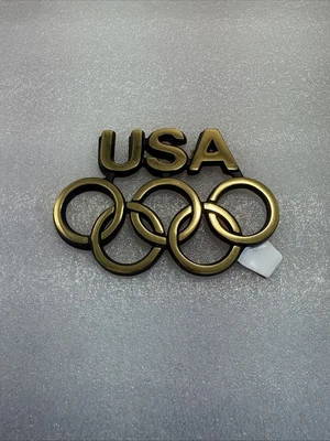 Insignia vintage de los Juegos Olímpicos del siglo Buick 1984 emblema dorado metálico  Foto 1 de 4