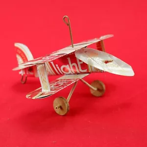 Avión de lata de cerveza modelo vintage hecha a mano de los años 80 Milwaukee Light - Imagen 1 de 7