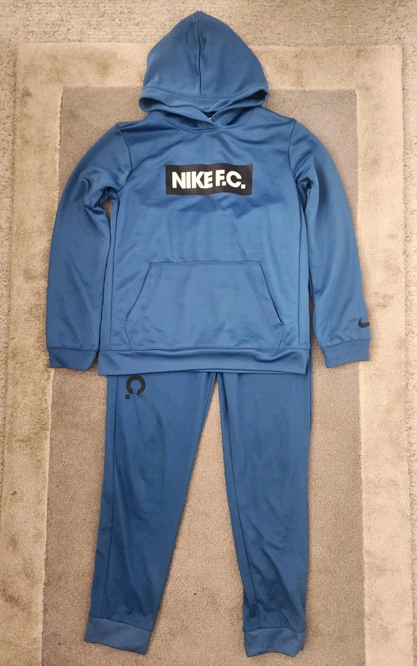 Nike dri-fit boys blue tracksuit size L 147cm- 158cm age 12-13 years tapered leg - Image 1 of 4