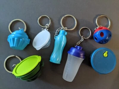 Scegli - NUOVI portachiavi Tupperware + magneti - quickshake smart steamer cupcake - Immagine 1 di 2
