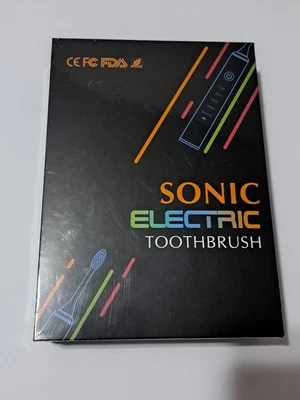 Cepillo de dientes eléctrico sónico Foto 1 de 3