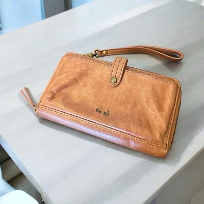 THE SAK Iris Tobacco Brown Flower Embossed Smartphone  Wristlet Wallet - Image 1 of 4