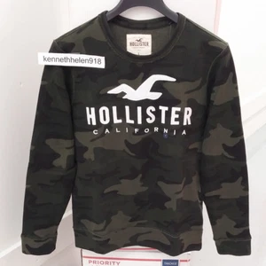 HOLLISTER LOGO GRAFIK SWEATSHIRT MIT RUNDHALSAUSSCHNITT TARNFARBEN HERREN GRÖSSE LARGE - Bild 1 von 6