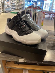 jordan 11 low tuxedo