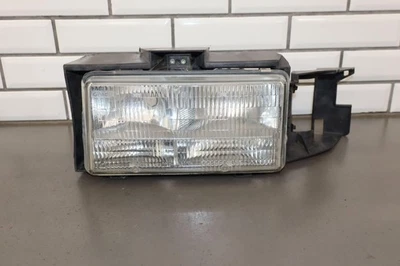 Cadillac Fleetwood 1993-1996 tracción trasera izquierda luz del conductor lámpara con soporte Foto 1 de 4