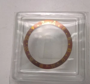 ULTRA RARE ROLEX GMT-MASTER 16718 LÜNETTENEINSATZ BRAUN NEU VERSIEGELT ORIGINAL 100% - Bild 1 von 5