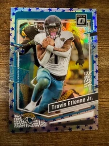 2023 Donruss Optic Travis Etienne Jr. Blue Stars Holo Prizm #86 SP Shortprint - Picture 1 of 8